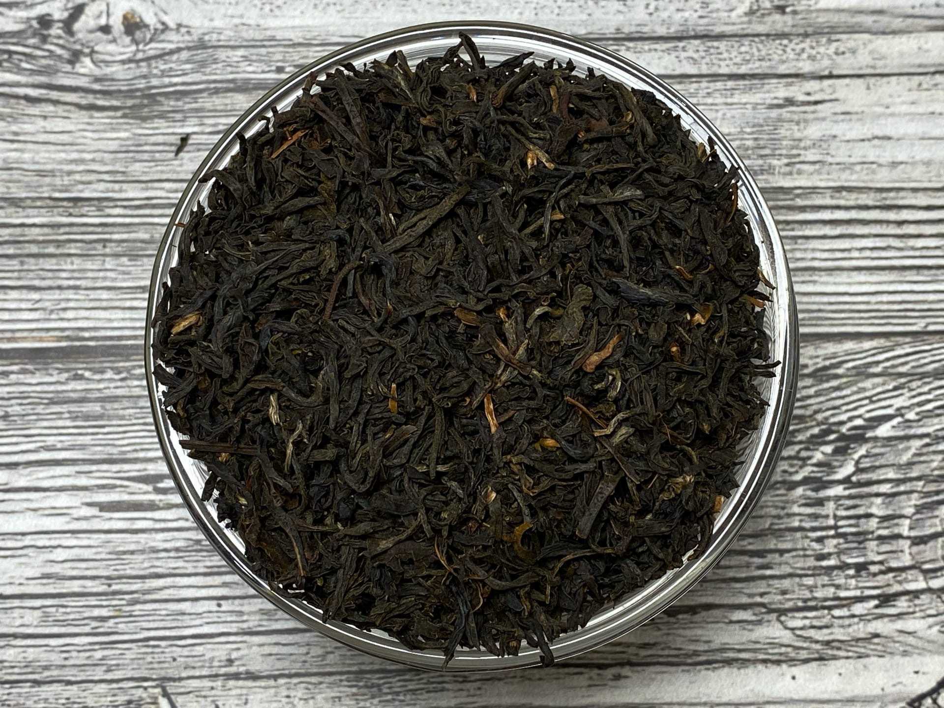 Чай черный индийский ассам. Индийский чай Ассам. Ассам TGFOP. Индийский чёрный чай Ассам. Чай черный Assam.